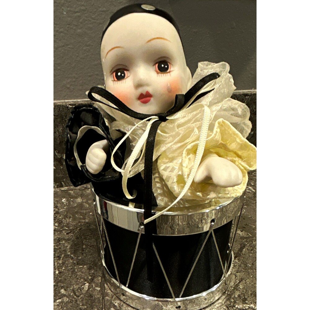 The San Francisco Music Box Company Porcelain Doll-plays music & moves